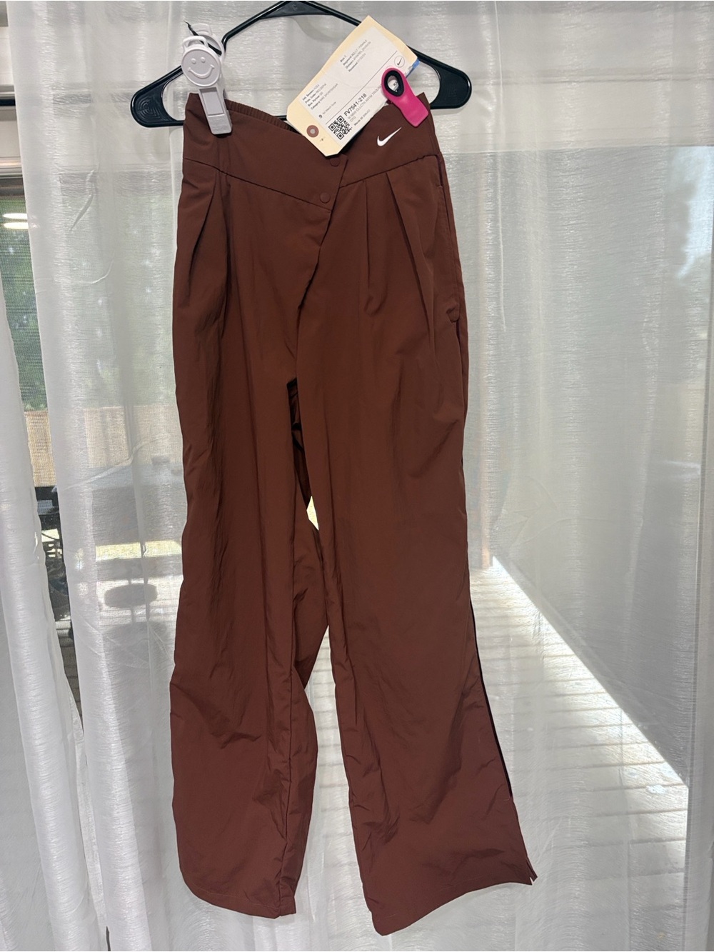Nike women's mid-rise repel asymmetrical-waist trousers
